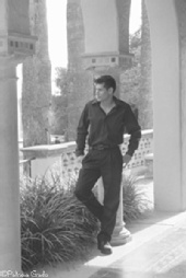 Robby - Leaning Against White Pillar