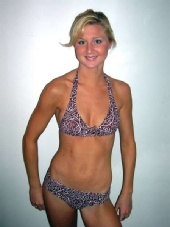 Carolyn Yates - brown suit pose