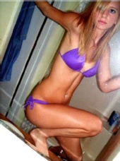 Danielle Carver - Purple suit.