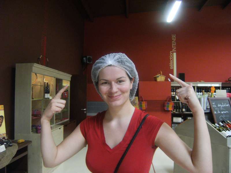 Devina Wolfe - wearing a protective cap in a French Chocolate factory