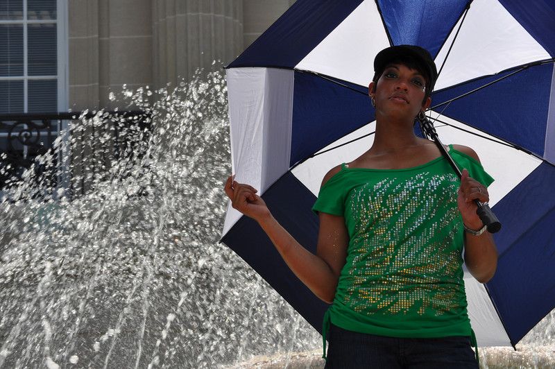 Sherrisse Johnson - Umbrella in the fountain