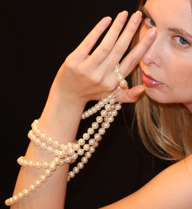 monkat1781 - hand on pearls