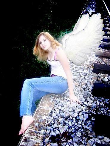 Miss Courtney - Wings on the Train Tracks