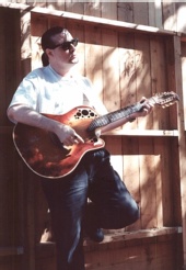 Jeff J - Musician on fence